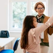 Modern classroom with high-speed network supporting digital learning tools, laptops, and smartboards.