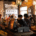 Customers enjoying free Wi-Fi in modern café