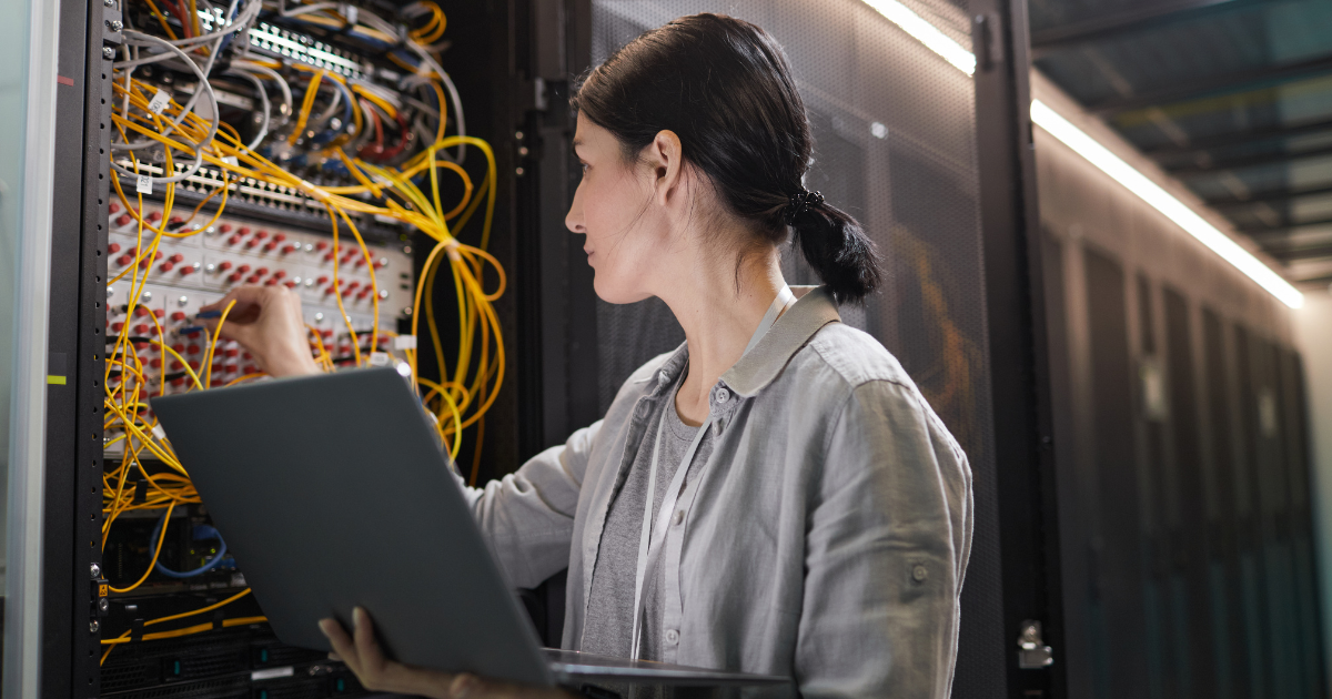 Technician installing Cat6 cabling