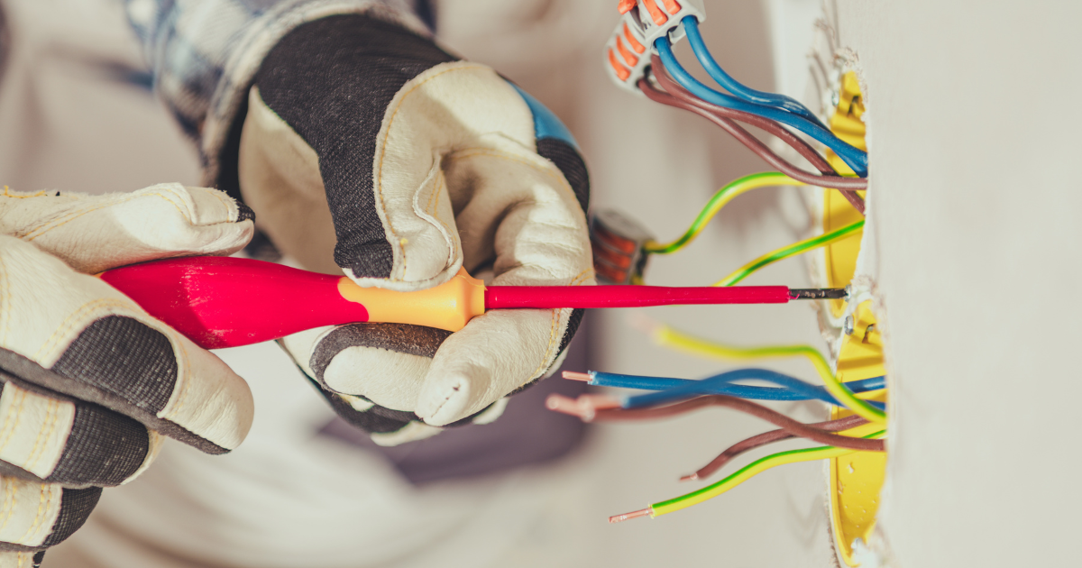 Certified professionals installing structured cabling in office