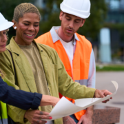 business-network-review-meeting Team reviewing cabling health check report for modern office environment.