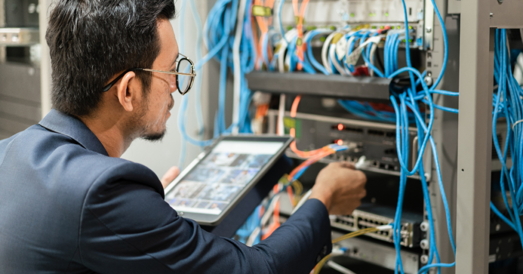 Structured cabling engineers installing commercial network infrastructure